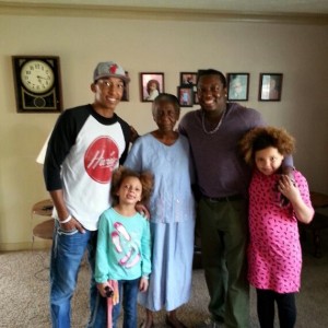 Victor with his son, daughters, and mother