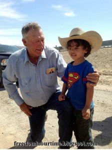 Alleged racist Cliven Bundy, seen here dropping everything to play with a little brown child.